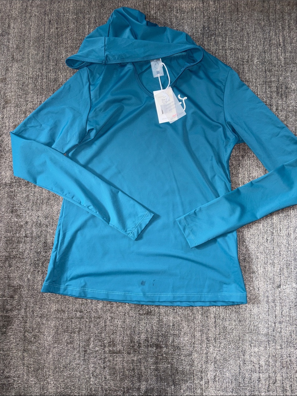 Skipper Teal Long Sleeve Hooded Performance Top